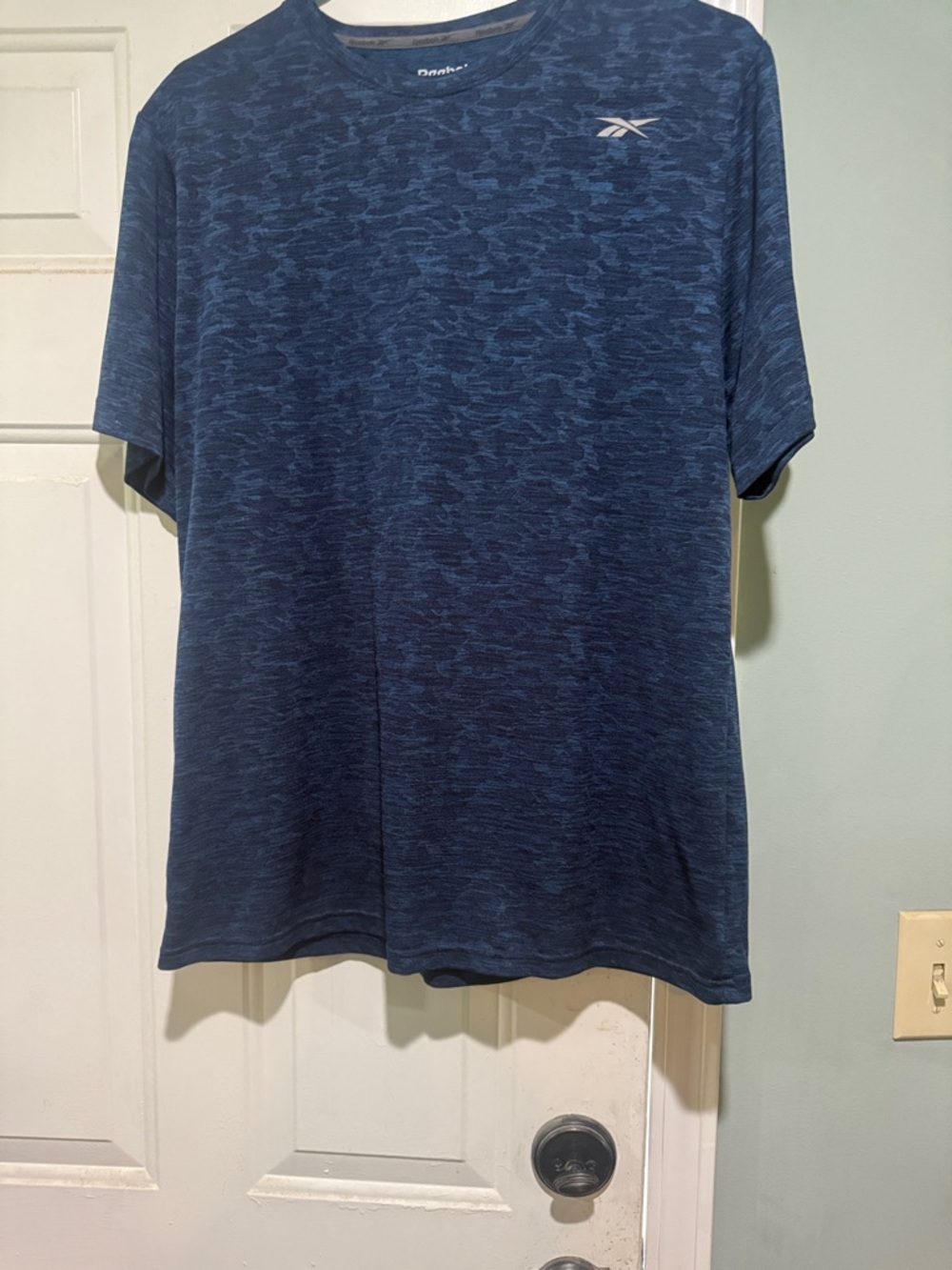 Short sleeve Reebok tshirt.